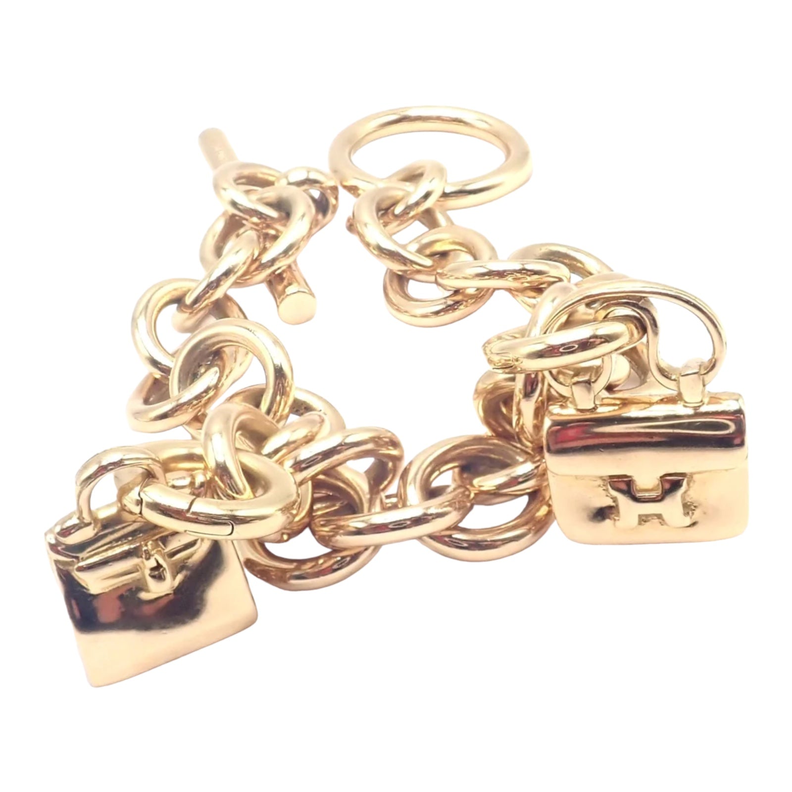 Authentic! Hermes 18k Yellow Gold Heavy Link Toggle With Two Charms Bracelet | Fortrove