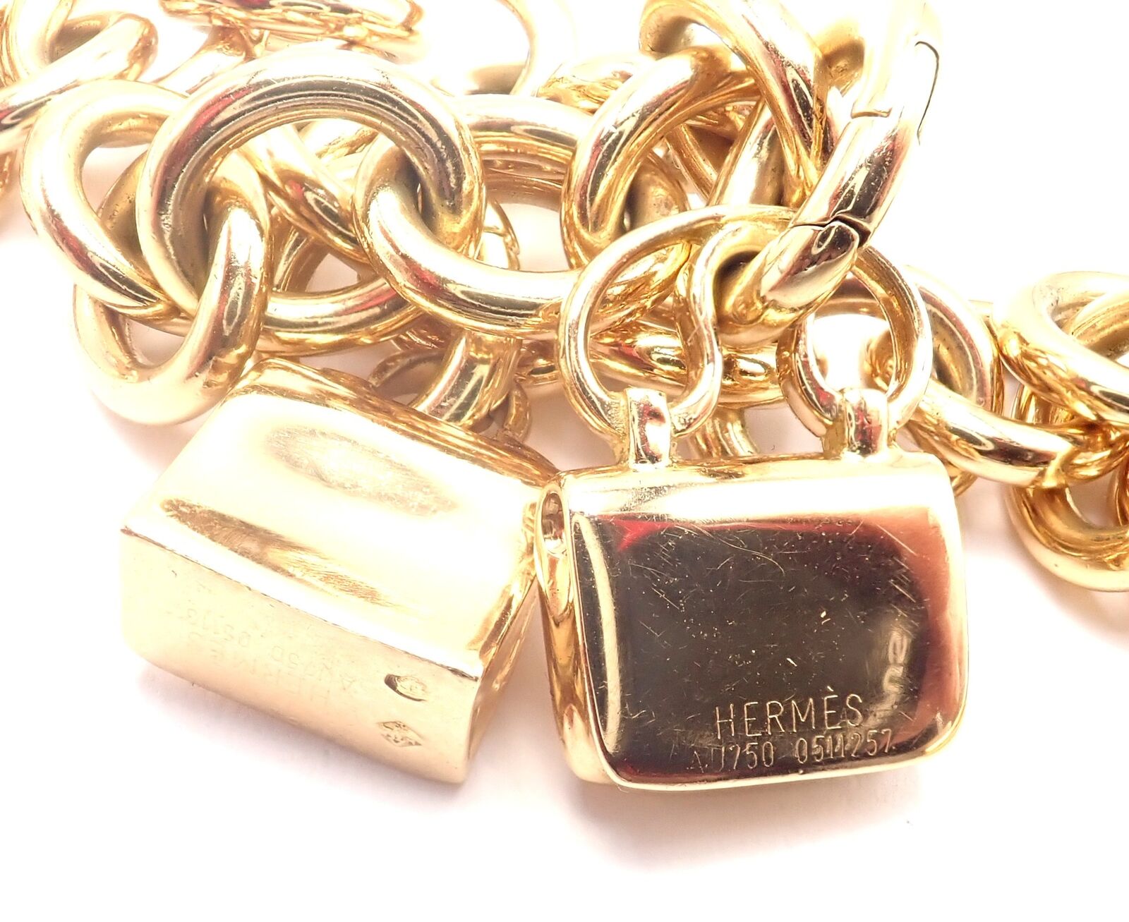 Authentic! Hermes 18k Yellow Gold Heavy Link Toggle With Two Charms Bracelet | Fortrove