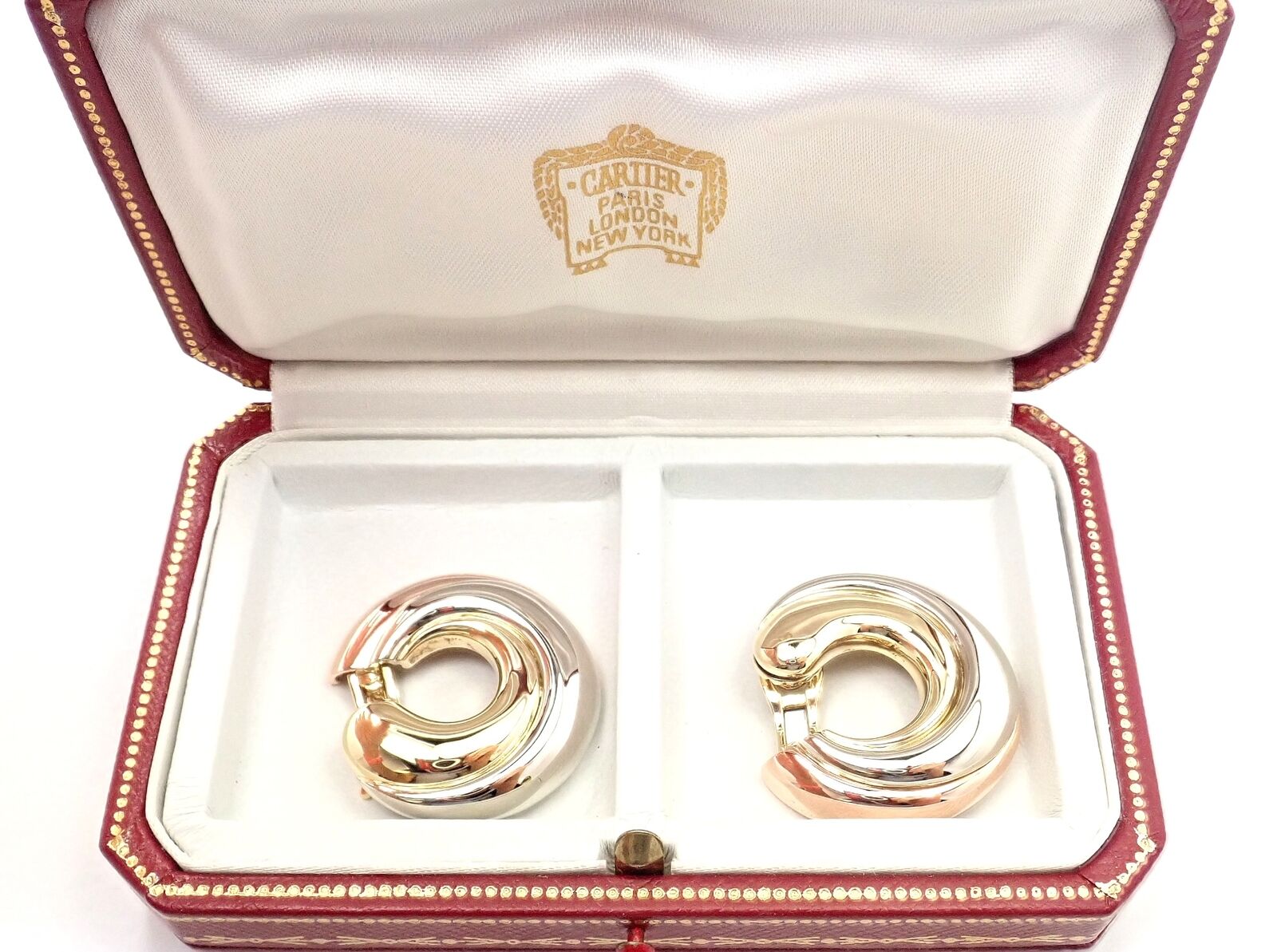 Authentic! Cartier 18k Tri-Color Gold Large Size Trinity Swirl Hoop Earrings | Fortrove