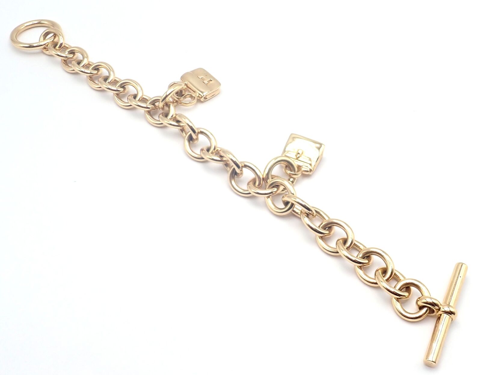 Authentic! Hermes 18k Yellow Gold Heavy Link Toggle With Two Charms Bracelet | Fortrove