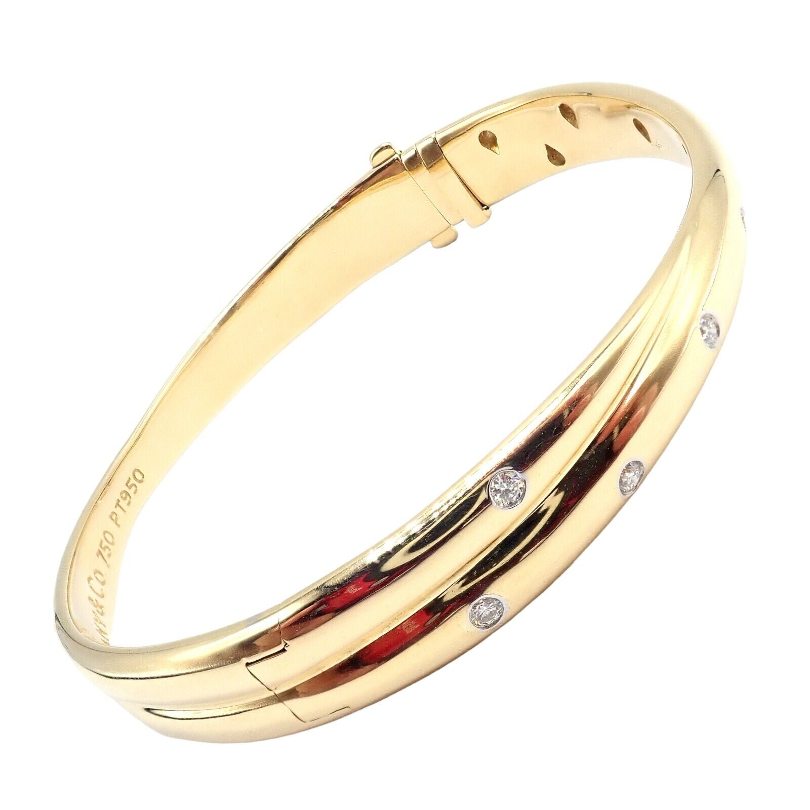 Tiffany & Co. Jewelry & Watches:Fine Jewelry:Bracelets & Charms Tiffany & Co 18k Yellow Gold Platinum Etoile Diamond Crossover Bangle Bracelet