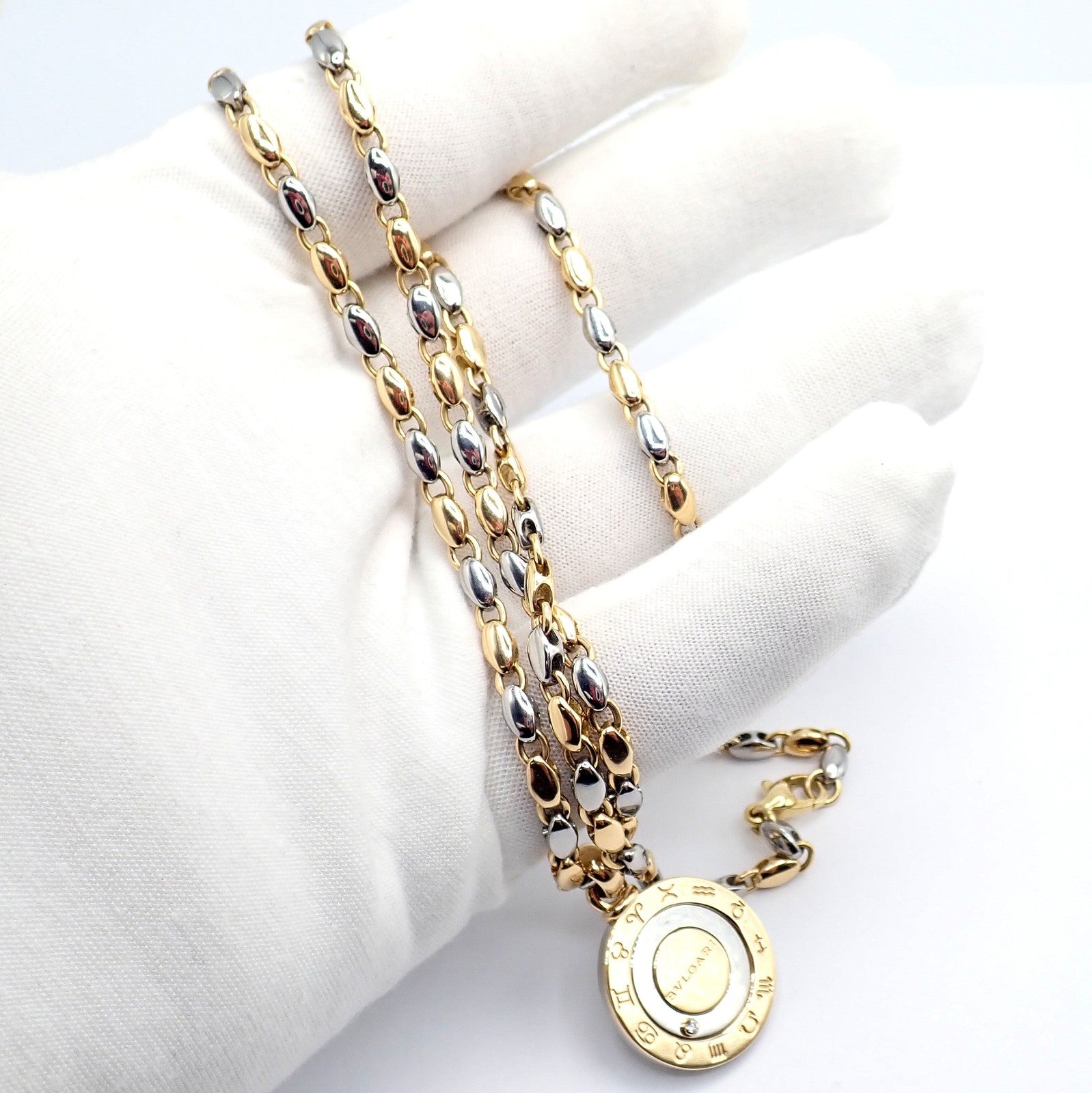 Authentic! Bulgari Bvlgari 18k Yellow Gold Steel Diamond Zodiac Pendant Necklace | Fortrove