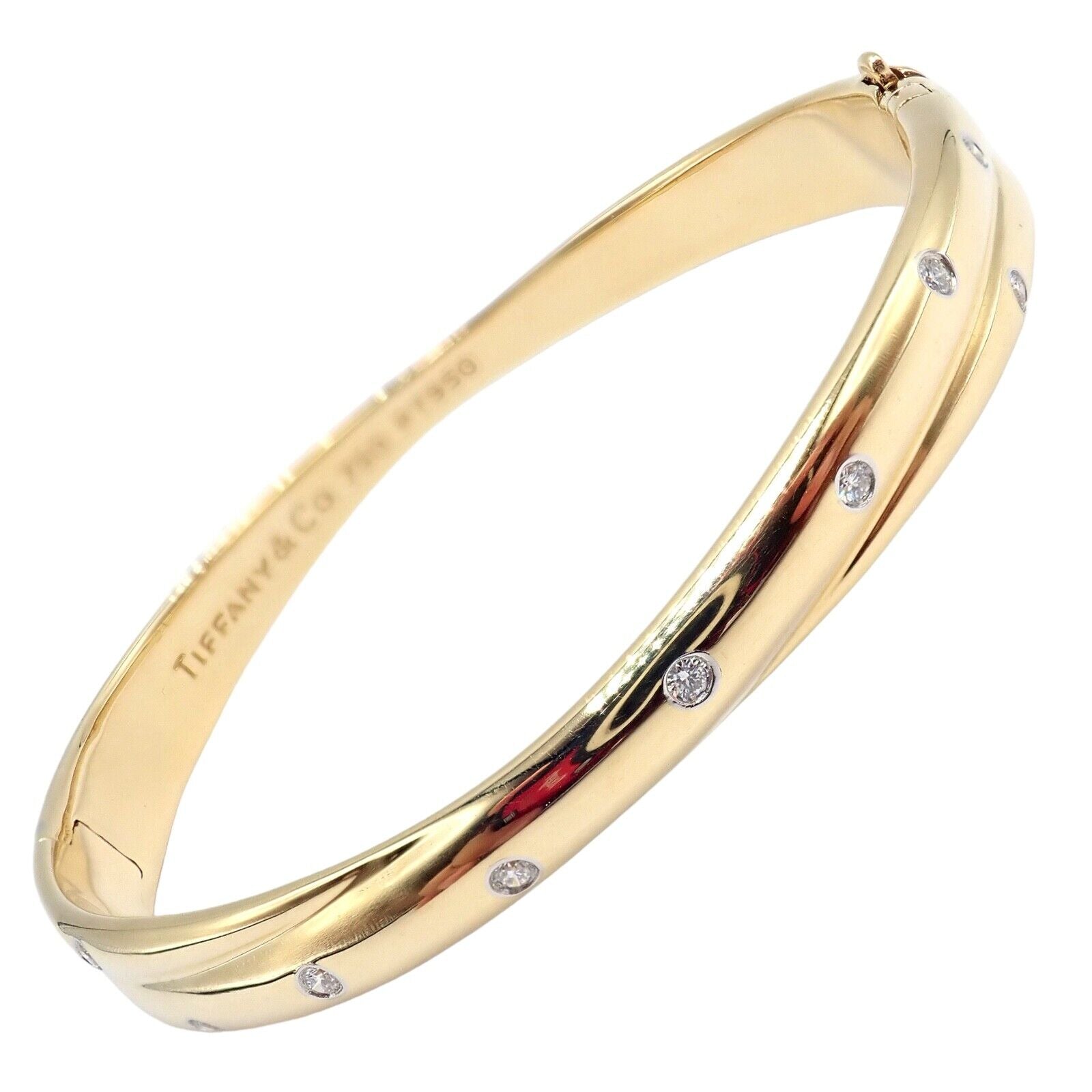 Tiffany & Co. Jewelry & Watches:Fine Jewelry:Bracelets & Charms Tiffany & Co 18k Yellow Gold Platinum Etoile Diamond Crossover Bangle Bracelet