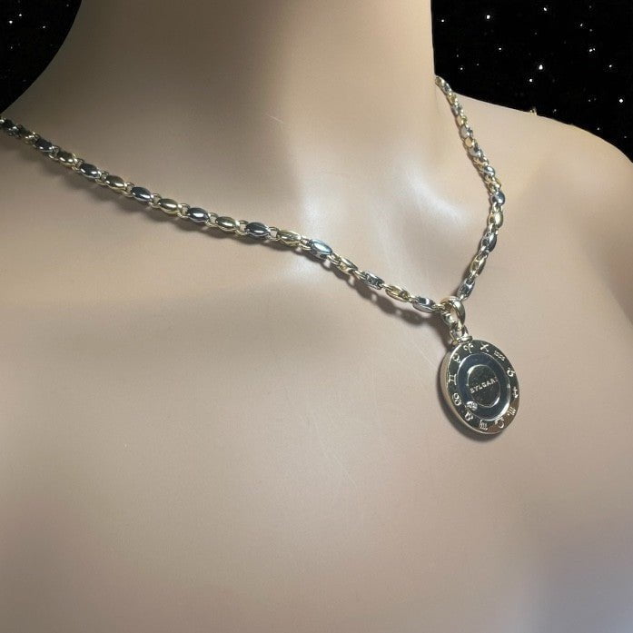Authentic! Bulgari Bvlgari 18k Yellow Gold Steel Diamond Zodiac Pendant Necklace | Fortrove