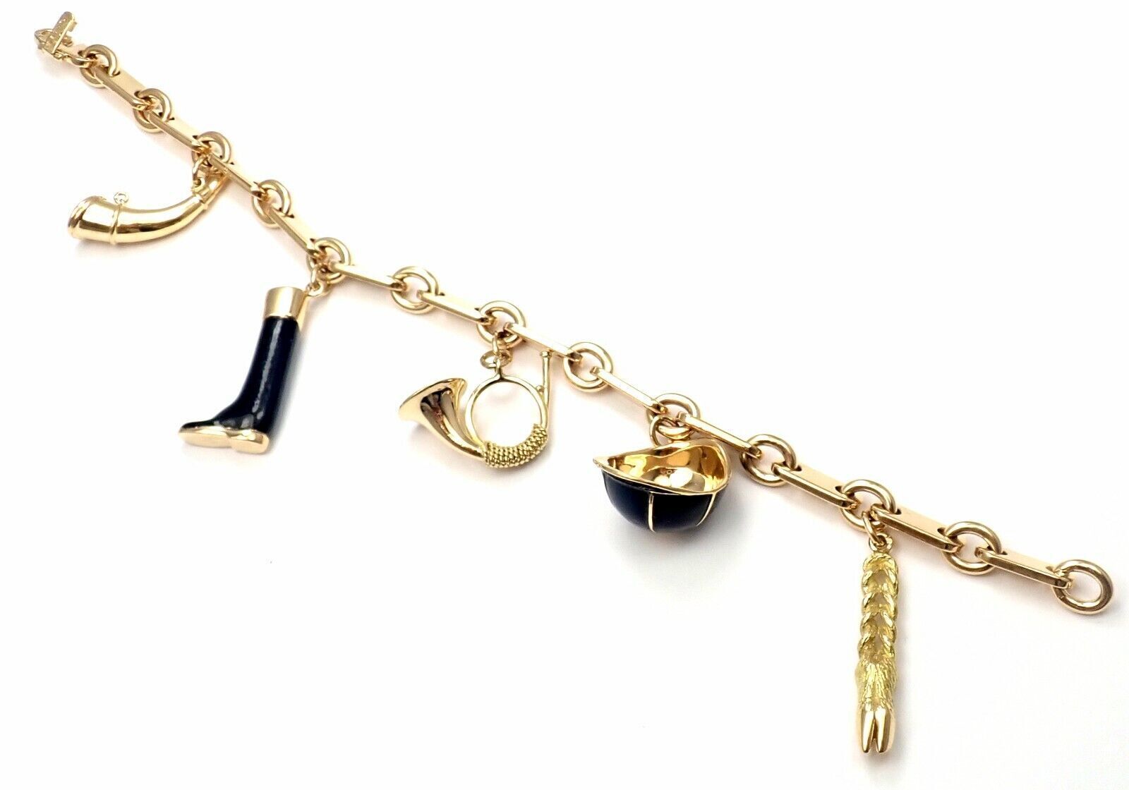 Stunning 18k Yellow Gold Charm Bracelet with 19 18k Gold Hermes