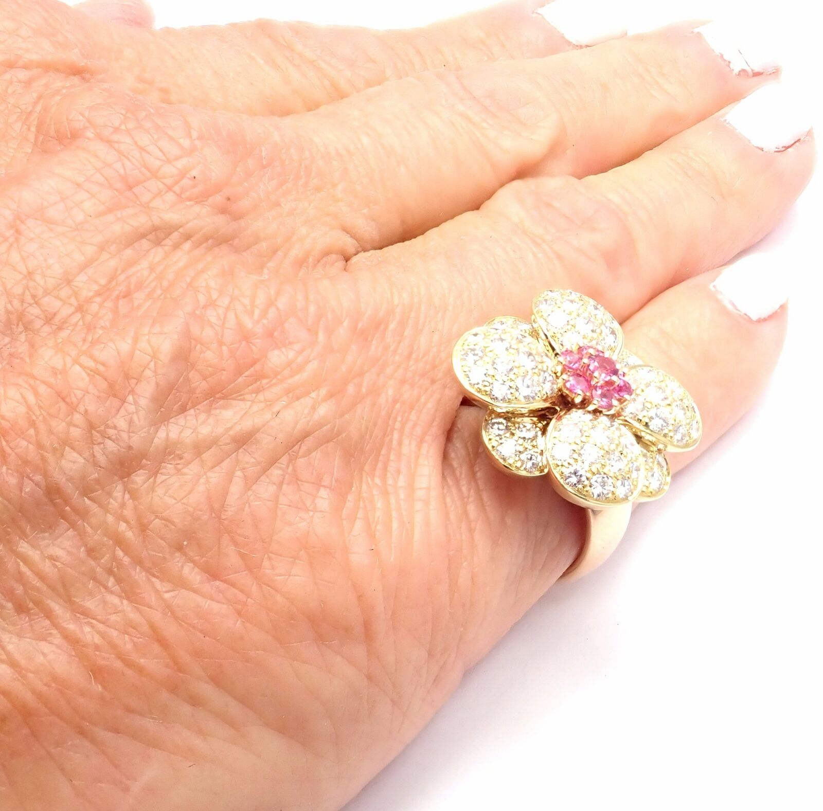 Van cleef and discount arpels flower ring price