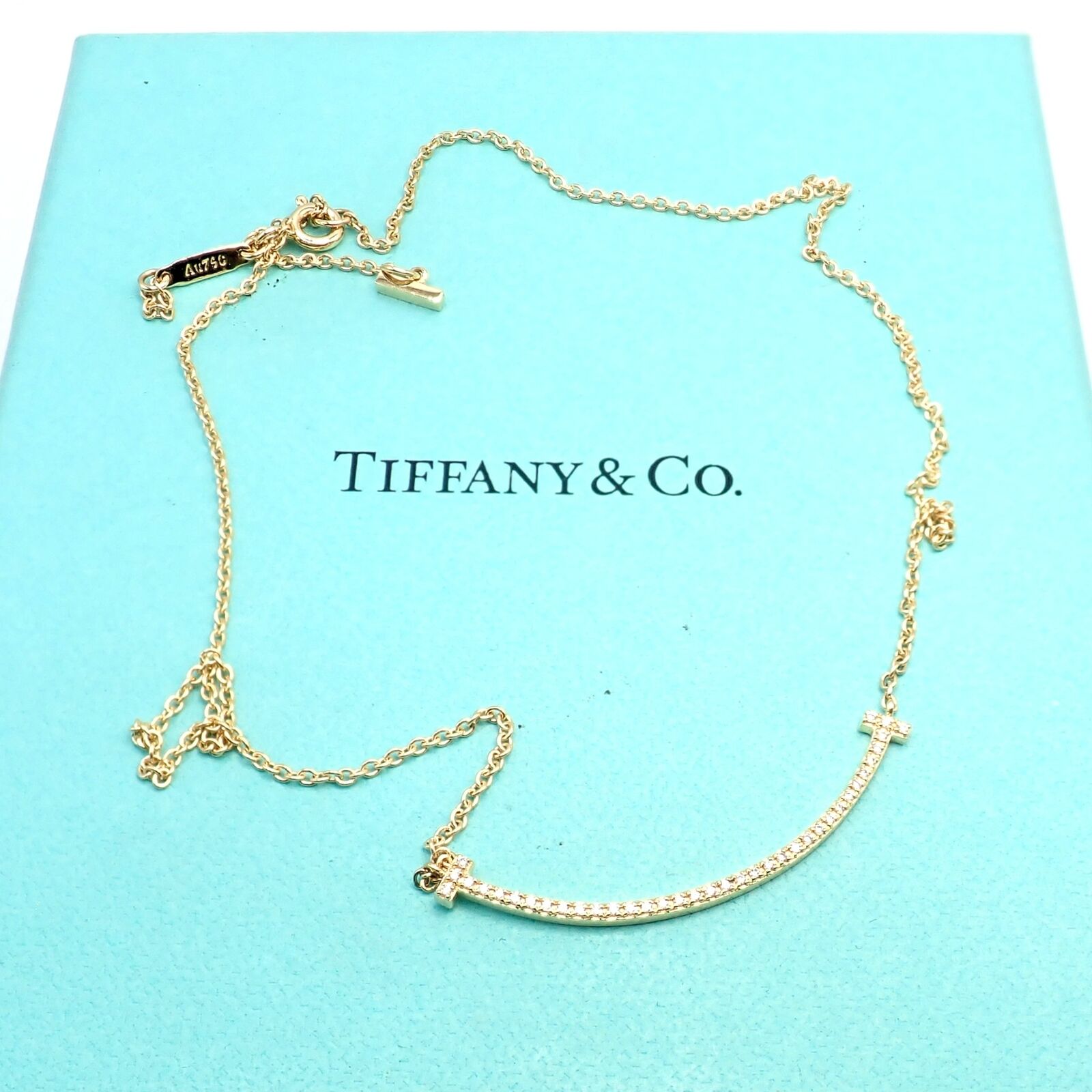 Authentic! Tiffany & Co 18k Yellow Gold Diamond Small T Smile Necklace | Fortrove