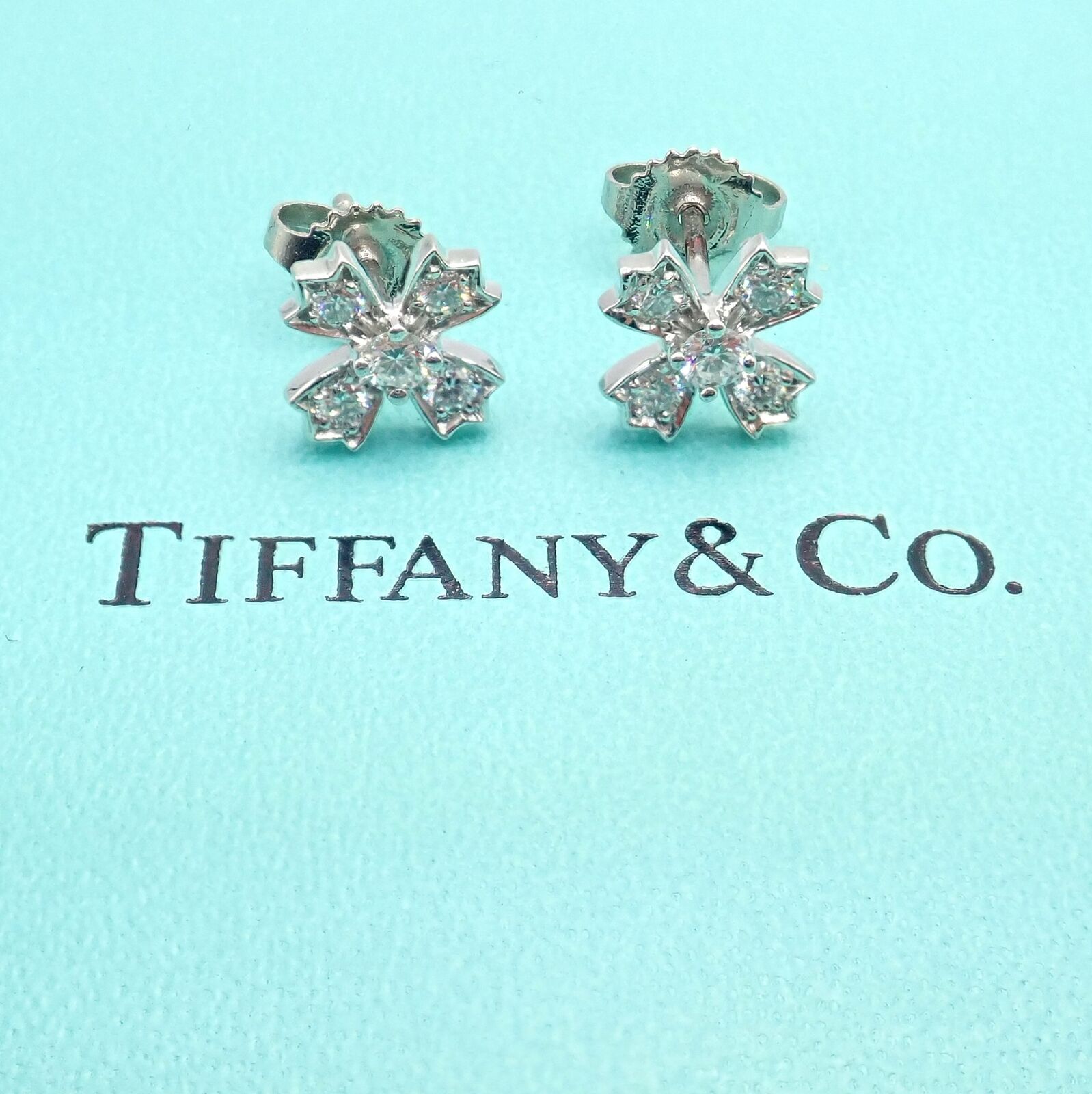 Platinum Tiffany & Co. bezel-set diamond flower stud earrings with clutch  back closure. Includes box and dust b… | Flower earrings studs, Earrings, Diamond  earrings