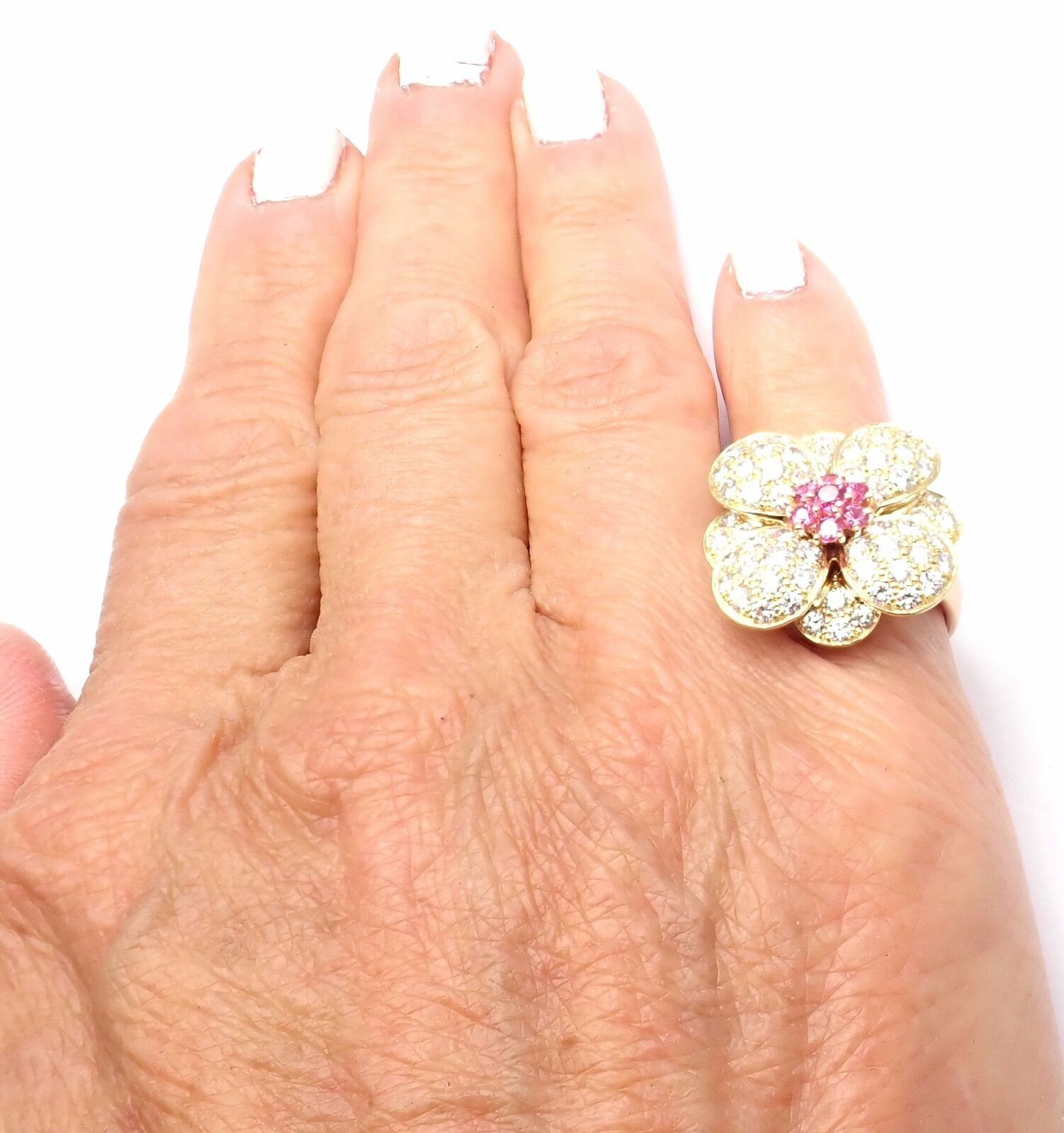 Van cleef and discount arpels flower ring price