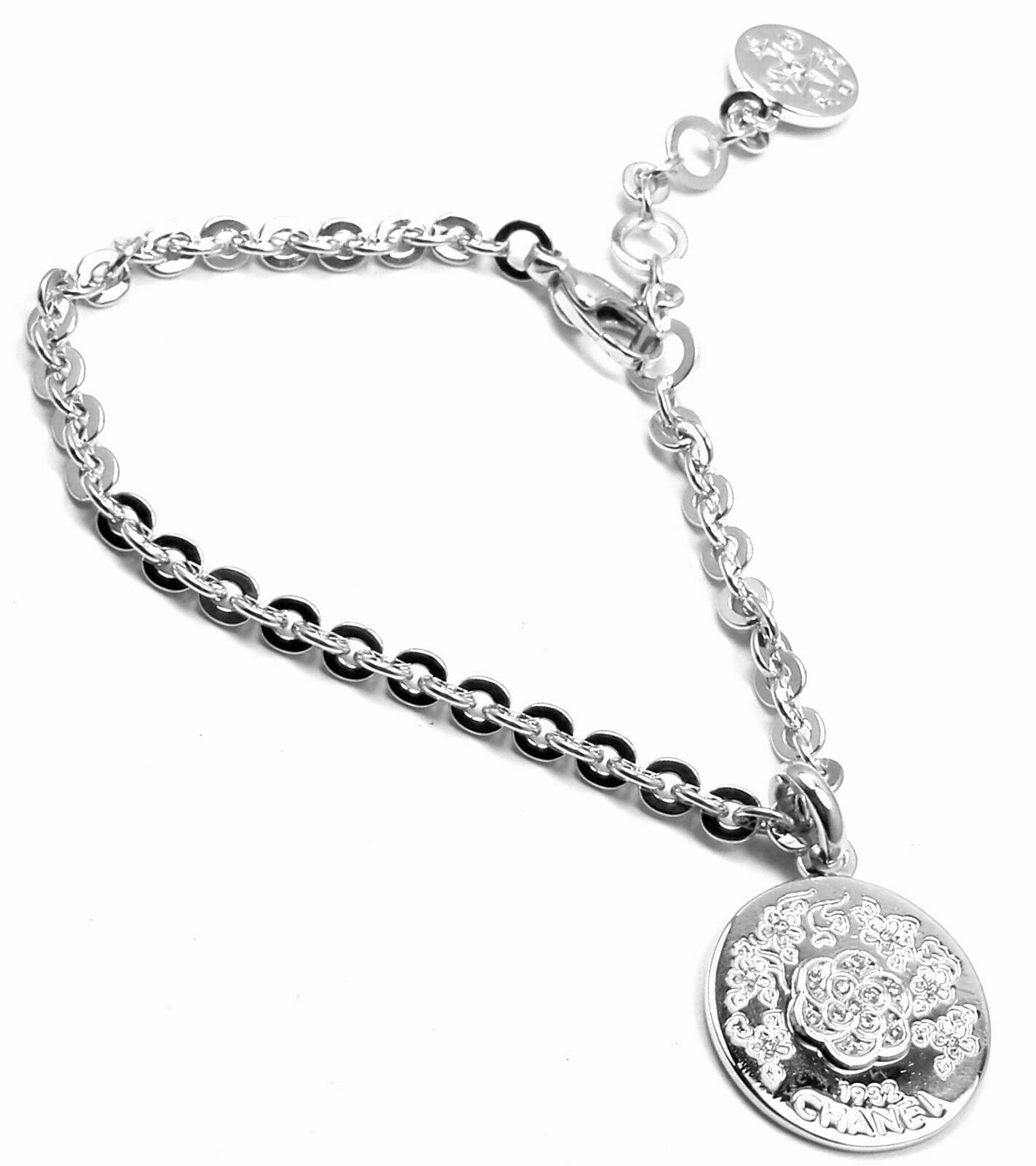 Authentic! Chanel Camellia Comete 18k White Gold Diamond Link Charm Bracelet
